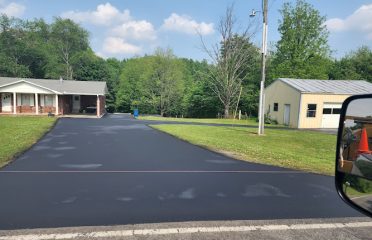 R.E.L. Asphalt Sealcoating